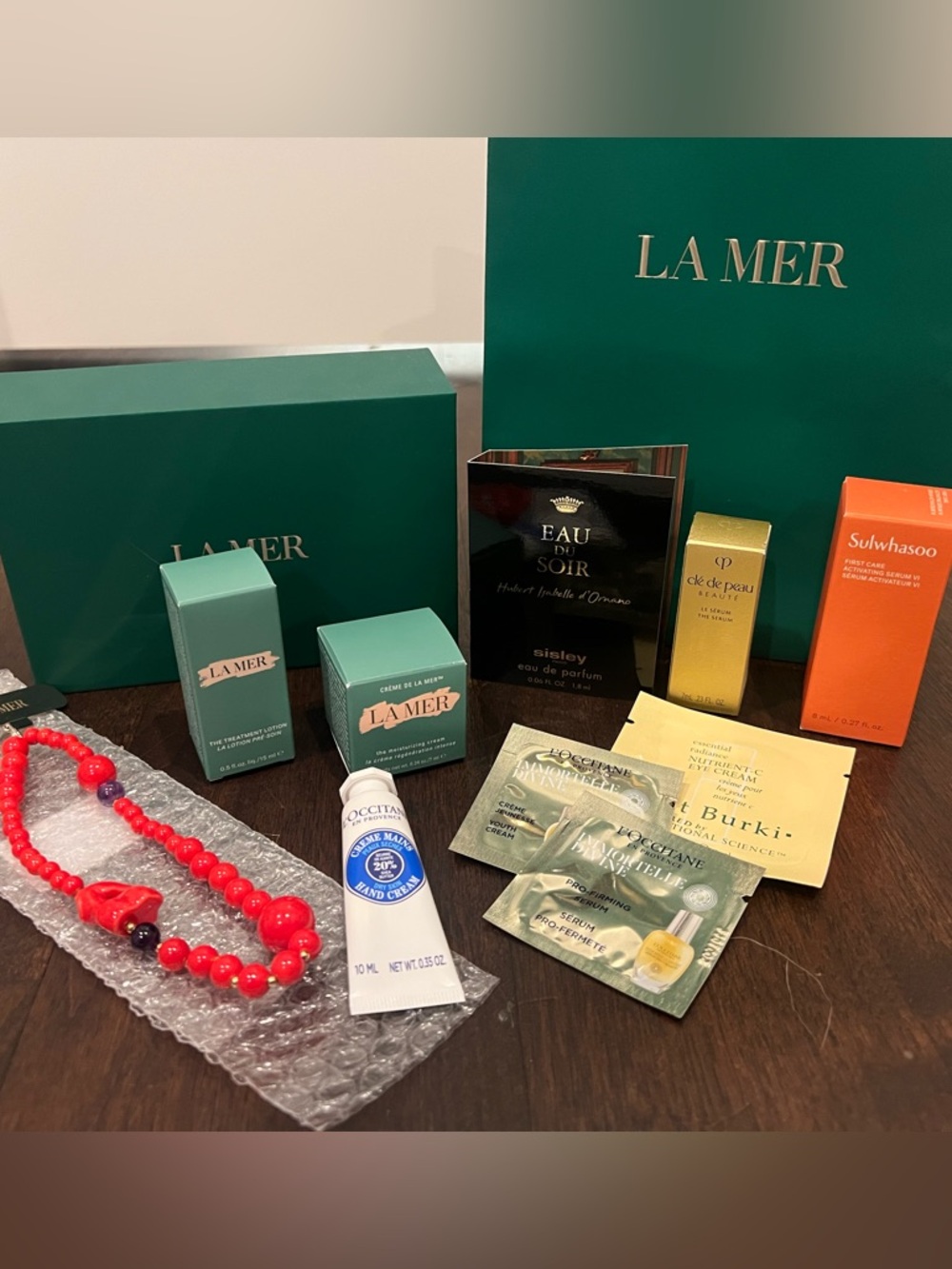 La Mer Phone Wristlet and Skincare Goodies